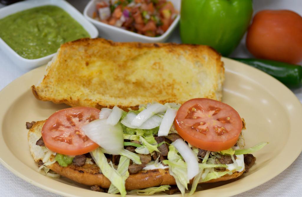 Torta Mexican Sandwiches · W/ sour cream, guacamole, cheese, onion, lettuce & tomatoes.