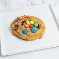 M&M · Made from chocolate chunk cookie dough topped with Hershey's Kisses, semi sweet chunks and M...