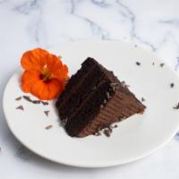 The Chocolate Yard · Three layers of chocolate cake with chocolate icing.