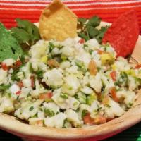 Ceviche 16oz · Chopped tilapia mixed in tomatoes, onions, cilantro, serrano, avocado, and lime. chips or to...