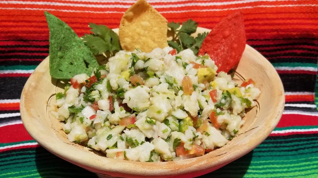 Ceviche 16oz · Chopped tilapia mixed in tomatoes, onions, cilantro, serrano, avocado, and lime. chips or tostadas.