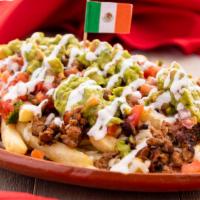 Carne Asada Fries · Include: French fries, melted cheese, beef, pico de gallo, guacamole, and sour cream