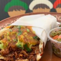 volcano taco · handmade tortilla,melted cheese,asada,chorizo,guacamole ,and tomatillo salsa and side cactus...