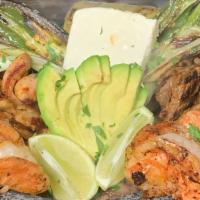 Molcajete Mixto · include: chicken, beef, shrimp, jalapeno pepper, green onion, cactus, queso fresco, pinto be...