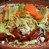 Meli Enchiladas · include: 5 enchiladas stuffed with potato , cooked with red sauce on top fresh cheese, cabba...