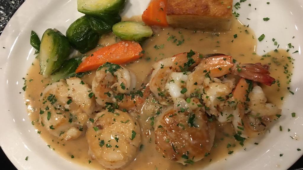 Combo Scallop & Prawn Sauté · Served with vegetables & potatoes of the day.