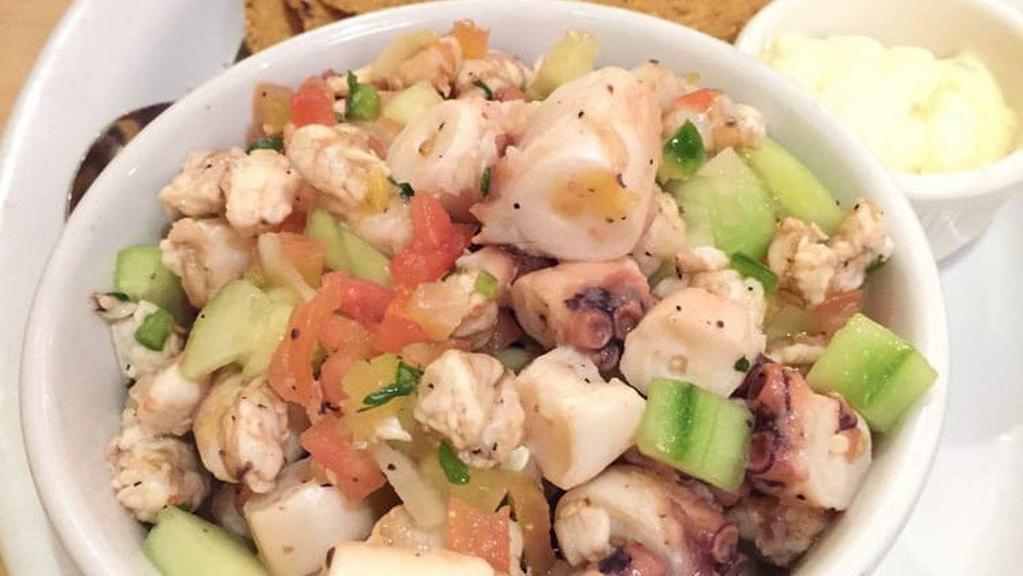 Ceviche · Lime marinated raw shrimps, tomatoes, cucumbers, onions, jalapeños, cilantro.