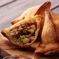 (G) Chicken Samosa - 2Pcs · Crispy puffs filled with sauteed chicken and peas.