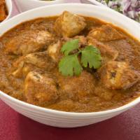Kadhai Lamb  · Lamb chunks cooked in our unique kashmiri red chili and spicy gravy with tomato and bell pep...