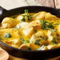 Chicken Coconut · Boneless chicken cooked w/ nuts, raisins, exotic herbs & spices in a rich coconut creamy sauce