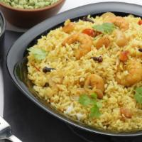 Seafood Biryani · Rice aromatically flavored with indian spices and cooked with prawn & mahi fish. Gluten free.