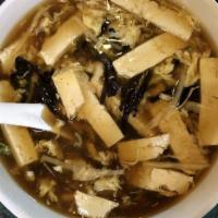 C5. Hot & Sour Soup · Chicken breast, mushrooms, tofu, and egg blossom.