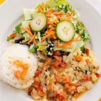 Grilled Tilapia with Cappers & Butter Sauce · Served with rice and salad.