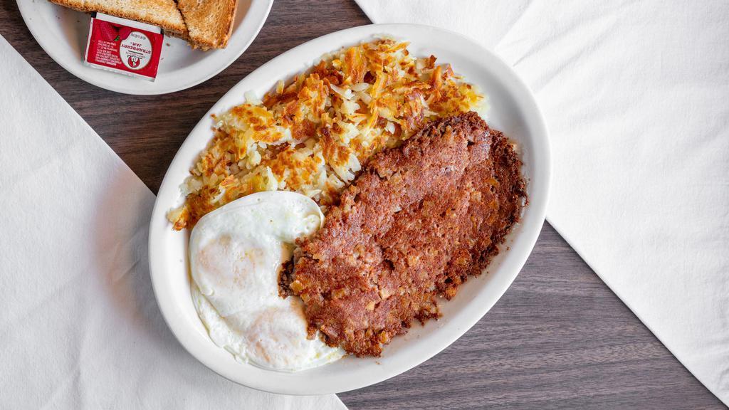 Corned beef hash and two eggs · 