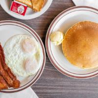 Country Breakfast · Two buttermilk pancakes and two eggs with your choice of bacon, sausage patty, ham or meat p...