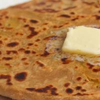 Aloo Paratha · Quantity 2 with No Onion and No Garlic Pickle + Dahi
A flatbread made whole wheat flour stuf...