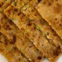 Paneer Paratha · Quantity: 2 with No Onion and No Garlic Pickle + Dahi
A flatbread made whole wheat flour stu...