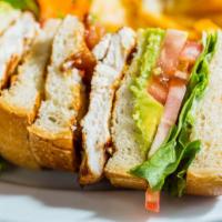 Crepevine Club · Freshly grilled chicken breast on sourdough with crisp bacon, avocado, lettuce, tomatoes and...