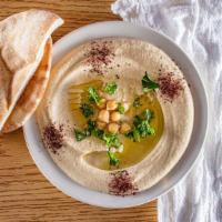 1. Hummus · Garbanzo beans with garlic, lemon juice, tahini & extra virgin olive oil.