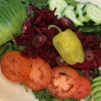 Avocado and Beet Salad (v) · Vegan and gluten-free. Romaine, baby spinach, tomato, shredded beet, cucumber, onion, avocad...