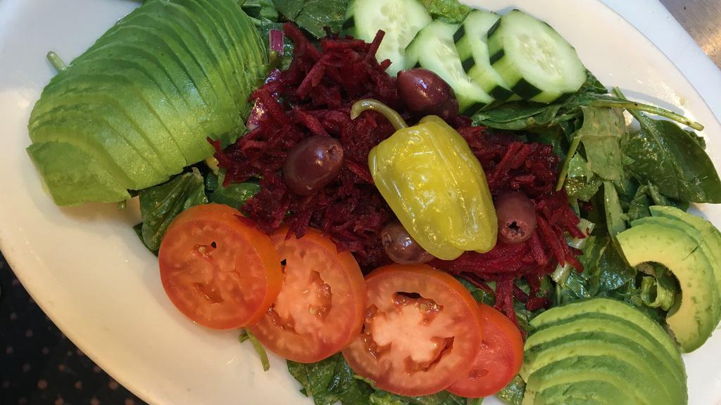 Avocado and Beet Salad (v) · Vegan and gluten-free. Romaine, baby spinach, tomato, shredded beet, cucumber, onion, avocado, and balsamic vinaigrette.