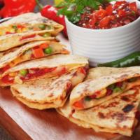 Garden Vegetables Quesadilla · Delicious quesadilla made with fresh garden vegetables, cheese and salsa.