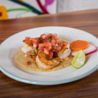 Taco de Camaron · one sautéed shrimp taco topped with chipotle crema, pico de gallo, salsa