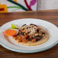 Taco de Hongos · one sautéed mushroom taco topped with queso cotija, salsa
