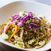 Veggie Jhap Chae · Sweet potato glass-noodles stir-fried with mushrooms, julienned carrots, cabbage, onion, and...