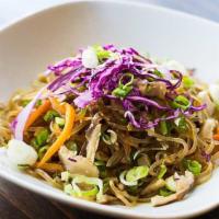 Jhap Chae · Sweet potato glass-noodles stir-fried with thinly-sliced beef, julienned carrots, mushroom, ...