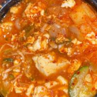 Soft Tofu Stew · Zucchini, onion, enoki mushroom, and scallions.