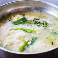 Rice Cake Soup · Sliced rice cakes in clear beef broth with eggs and scallions.