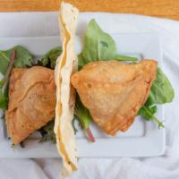 Samosas(2pcs) · Two crispy crust patties stuffed with delicious mix of potatoes, peas ginger, spices and fri...
