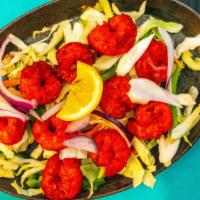 Shrimp Tandoori · Shrimp spiced and cooked slowly to perfection. Marinated in garlic, ginger spices and herbs ...