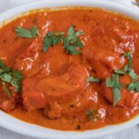 Butter Chicken · Tandoori chicken marinated and cooked in clay oven with creamy tomato sauce.