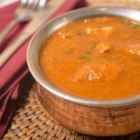 Chicken Curry · Tender boneless chicken sautéed in mild curry-based sauce.