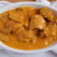 Chicken Korma · Boneless chicken cooked with nuts, delicate herbs and cream base gravy.
