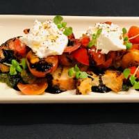 Heirloom Tomatoes & Burrata · Nordstrom Signature Recipe.  Grilled sourdough croutons, extra virgin olive oil, balsamic vi...
