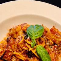 Spicy Wild Shrimp Pomodoro Pasta 
 · rosemary garlic shrimp, spaghetti alla chitarra, roasted garlic tomato sauce,
basil, parmesa...