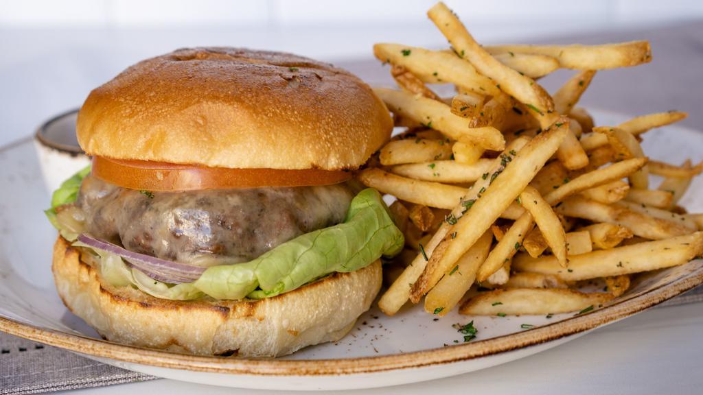 Nordstrom Burger · 1500/1140 cal. sharp white cheddar cheese, lettuce, tomato, red onion, roast garlic aioli, toasted artisan bun, Salt and Pepper crush french fries and kalamata aioli or side salad with Beyond Burger patty for an extra charge