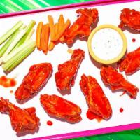 12 Wings · 12 crispy fried bone-in chicken wings in your choice of sauce