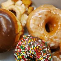 HALF DOZEN DONUTS · Mixed variety of raise, old fashion cake, French cruller and cake. Exclude specialties and f...