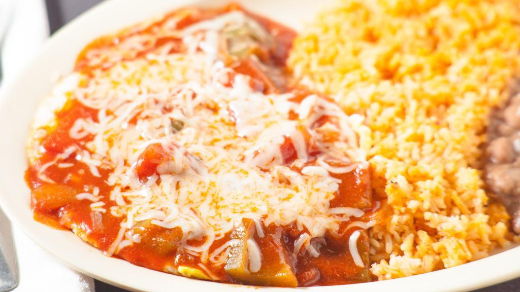 Huevos Rancheros Plate · 3 eggs over-easy topped with ranchero sauce and jack cheese.
