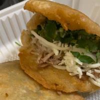 Gorditas · Thick homemade corn tortilla filled with refried beans, choice of meat, jack cheese, cilantr...