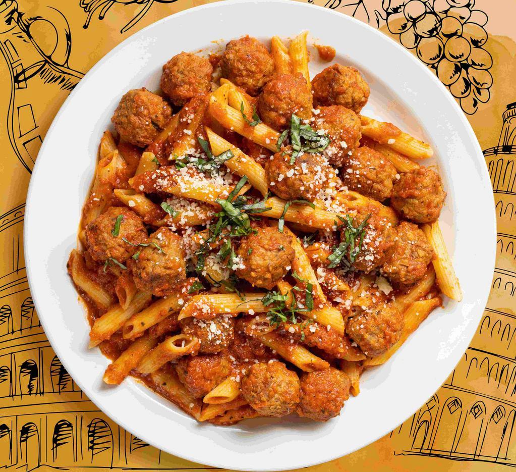 Penne Meatballs · Delicious penne pasta served with hearty italian-style meatballs with red sauce.