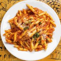 Penne For Your Thoughts · Delicious penne pasta cooked in a spicy tomato sauce.