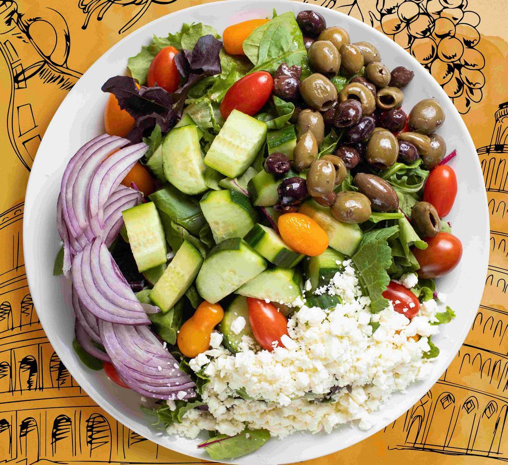 The Greek Surprise · Greek salad with cucumber, olives, tomatoes, onion, feta cheese over mixed greens.
