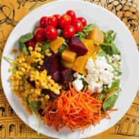 Beets By Bae · Our popular beet salad with red and golden beet, carrot, jicama, corn, feta cheese over mixe...
