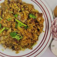 Chicken Keema Kothu Parotta · Mix of parottas, eggs and minced chicken well grilled with spices.