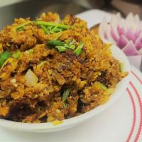 Egg Kothu Parotta · Mix of parottas and eggs chopped and well grilled with spices.